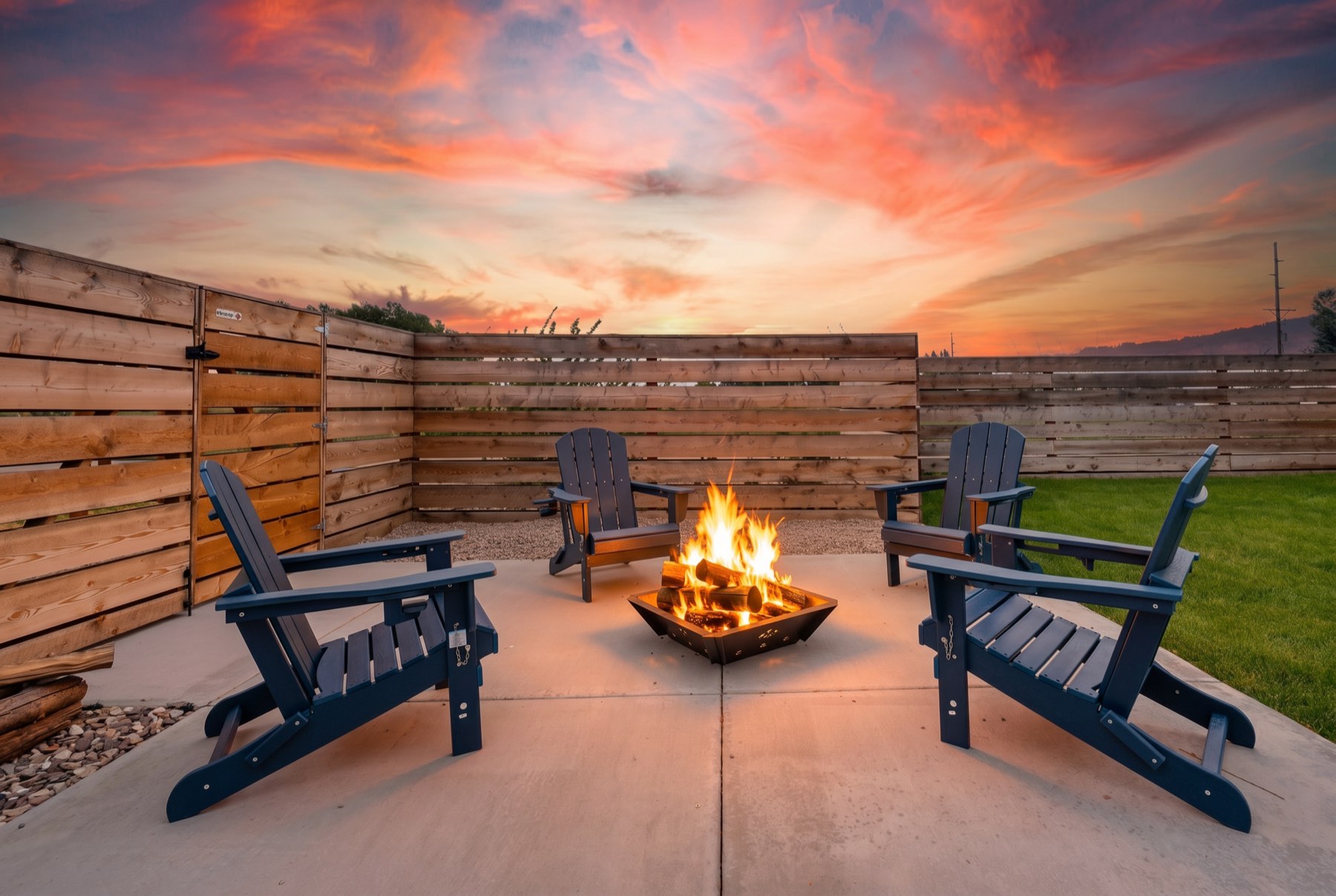 Fire pit at dusk under a wide Idaho sky at 2478 W 4700 S, Rexburg